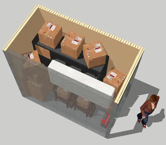 A group of boxes in the middle of a room.